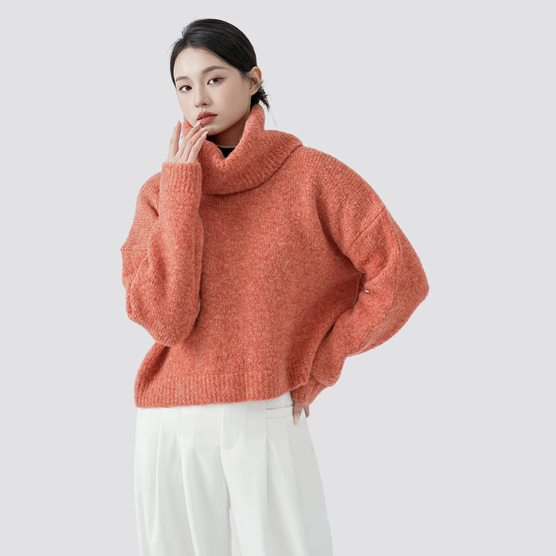 How does the choice of yarn affect the look, feel, and functionality of an orange loose neck pullover sweater?