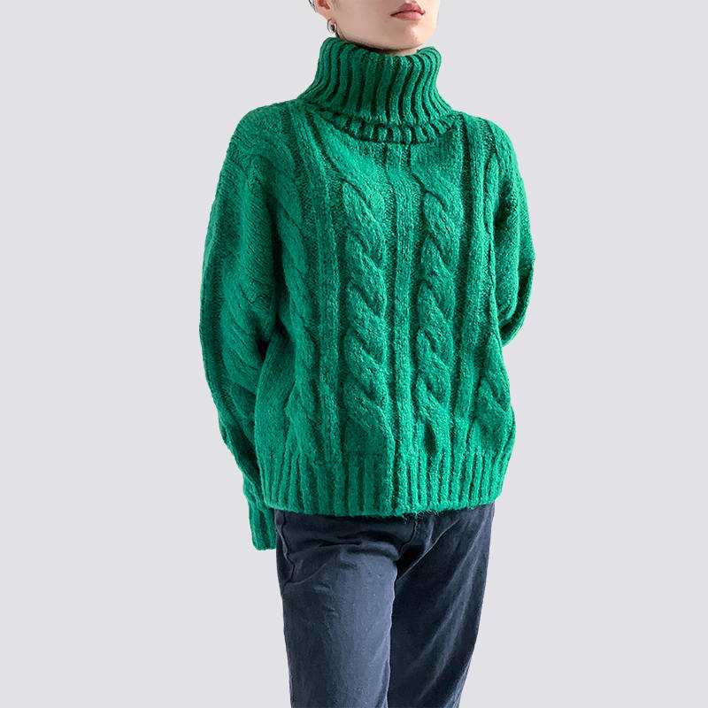 Green turtleneck cable sweater