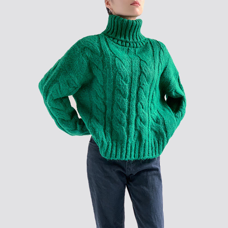 Green turtleneck cable sweater