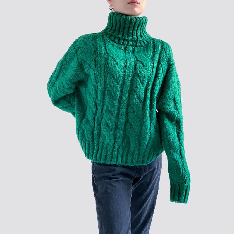 Green turtleneck cable sweater