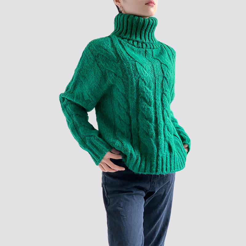 Green turtleneck cable sweater