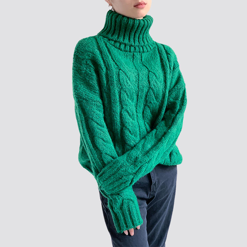 Green turtleneck cable sweater