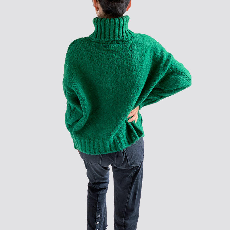 Green turtleneck cable sweater