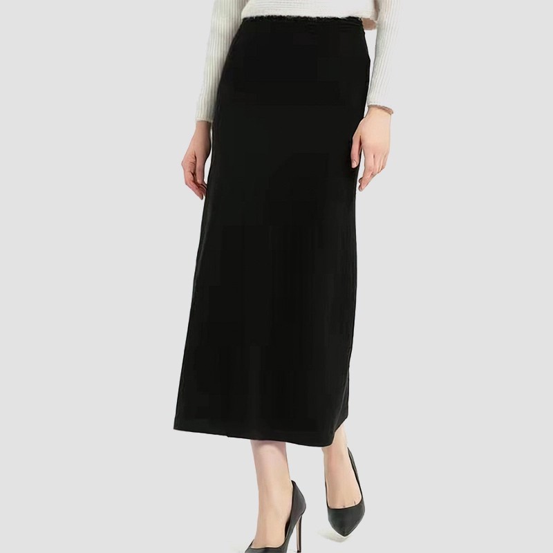 How does the use of pleats or other detailing in a black A-line skirt affect its appearance and overall styling options?