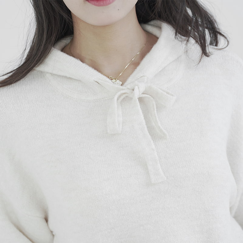 mid-length hooded knit top